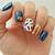 Get Ready for Fall Fun: Short Nail Designs for a Playful Look