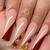 Glamorous Nail Art for Autumn: Glam Up with Scarecrow Designs