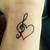 Heart With Music Notes Tattoo Designs