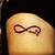 Infinity Sign With Cross Tattoo