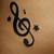 Music Notes With Stars Tattoo Designs