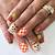 Playful Fall Manicure: Whimsical Scarecrow Nail Designs