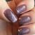 Regal Glamour: Reign Supreme with Dark Plum Nails