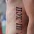 Roman Numeral Tattoo With Design