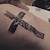 Side Cross Tattoo