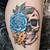 Skull And Flowers Tattoos