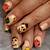 Slay the Fall Look: Striking Scarecrow Nail Art Ideas