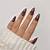 Sophisticated Temptation: Glamorous Chocolate Brown Nail Trends