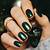 Stunning Sophistication: Embody sophistication through striking dark green nails