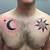 Sun And Moon Tribal Tattoo