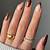 Sweater Weather Glam: Indulge in Stylish Brown Nails for Autumn
