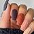 Sweater Weather Glam: Indulge in Stylish Brown Nails for the Coziest Season