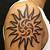 Tribal Sun Shoulder Tattoo