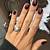 Unleash Your Inner Mystery: Dark Fall Nail Styles to Captivate