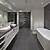 bathroom dark grey floor light grey walls