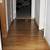 direction of hardwood flooring in hallway