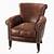 distressed brown leather armchair
