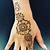 flower henna tattoo on hand