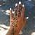 henna hand finger tattoo
