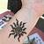 henna tattoo and sun