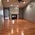 honey oak trim with dark wood floors