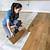 laying engineered flooring over floorboards