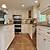 tile flooring with white cabinets