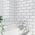 white metro tiles white grout bathroom