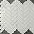 white porcelain herringbone tile