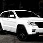 2015 Jeep Grand Cherokee White With Black Rims
