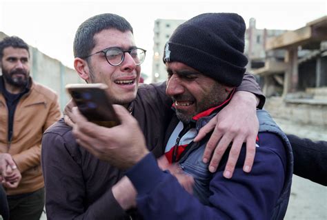Father and son reunited as detainees freed from Raqqa prison