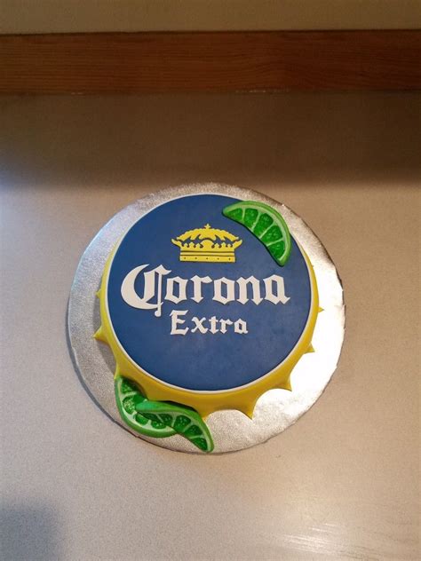 Just placed hot glue underneath the bottles to hold them in place and added the ribbon,name and numbers for finishing touches. A guy's Corona beer bottle cap cake. in 2019 | Birthday ...