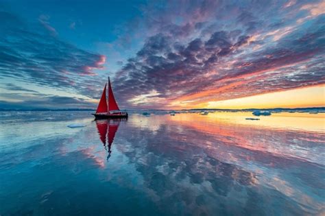 Sky Clouds Sunlight Boat Reflection In Sea Water Stock Photo Free Download