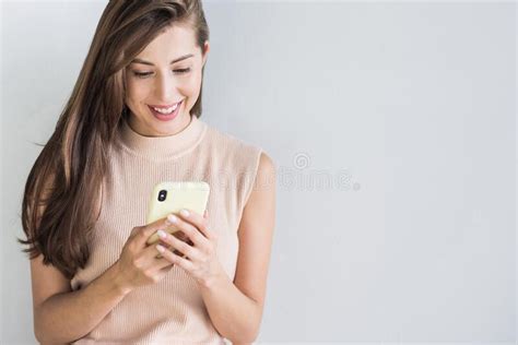 Young Beautiful Happy Woman Using Smart Phone Girl Texting On Her