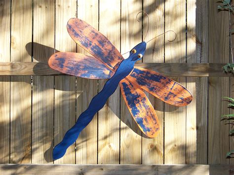 Auburn Dragonfly Made From Fan Blades And Fence Posts