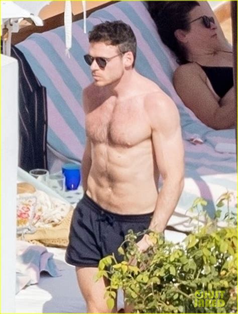 Richard Madden Relaxes Shirtless Poolside On Vacation In Italy Photo