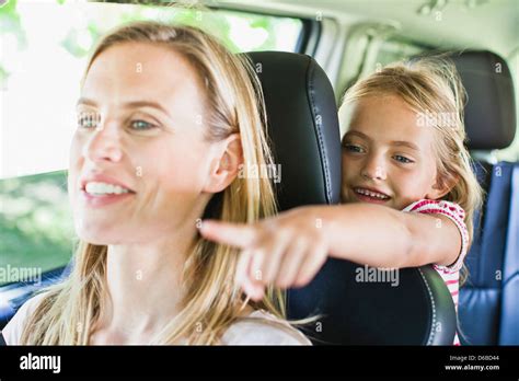 Mother and daughter talking in car Stock Photo - Alamy