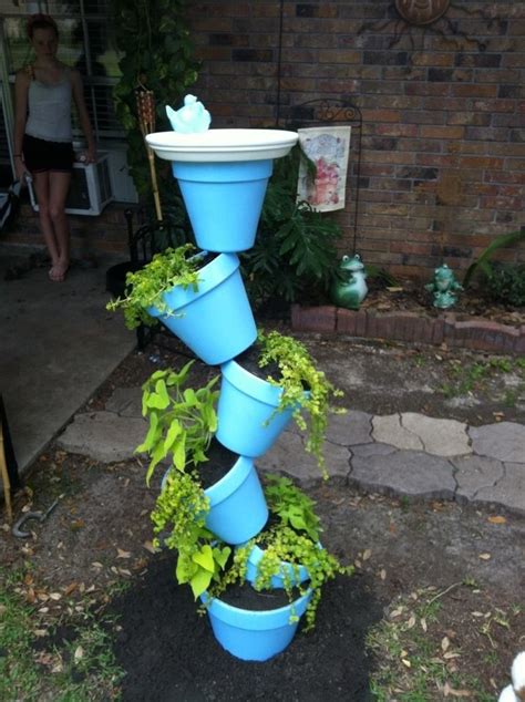 Love My Tipsy Pots Diy Garden Garden Ideas Tipsy Planter Pots
