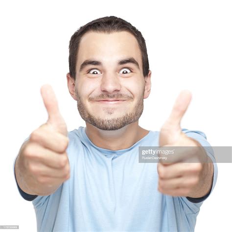 Happy Young Man With Thumbs Up High Res Stock Photo Getty Images