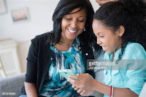 Showing Mom Phone Photos And Premium High Res Pictures Getty Images