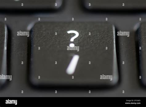 Forward Slash And Question Mark Key On A Laptop Keyboard Stock Photo