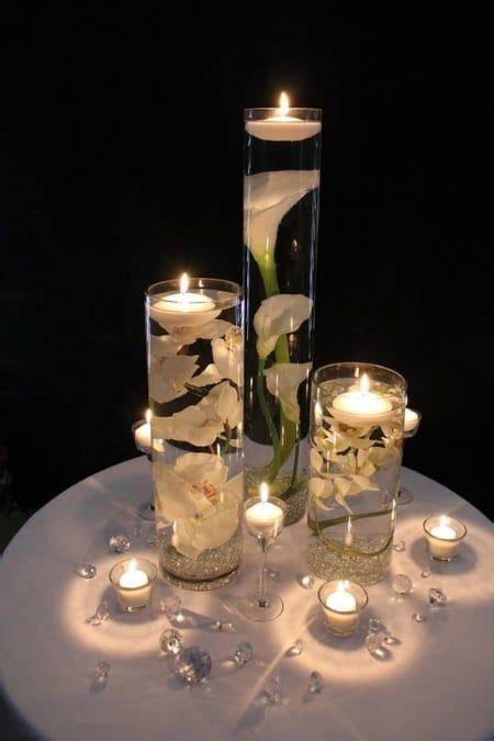 Floating Candle Centerpiece With Flower18 Wedding Reception Ideas