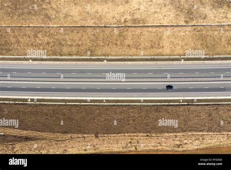 Aerial Top View Of Cars And Trucks Passing On A Highway Drone Shot