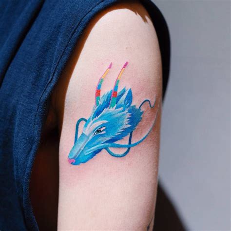 Blue Dragon Head Tattoo On The Upper Arm Dragon Head Tattoo Tattoos