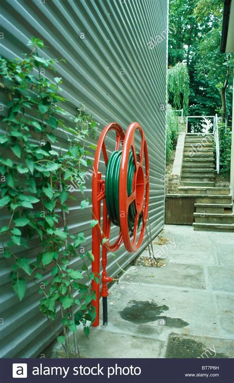 For us shoppers, the same garden hose rack is available in both sizes for $56.60 and $79.95 at garrett wade. Image result for MODERN WATER HOSE HOLDER | Water hose holder, Water hose, Hose holder