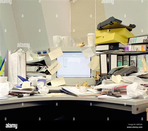 Very Messy Desk High Resolution Stock Photography And Images Alamy