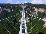 World's highest glass-bottomed bridge opens in China: Terrifying images ...
