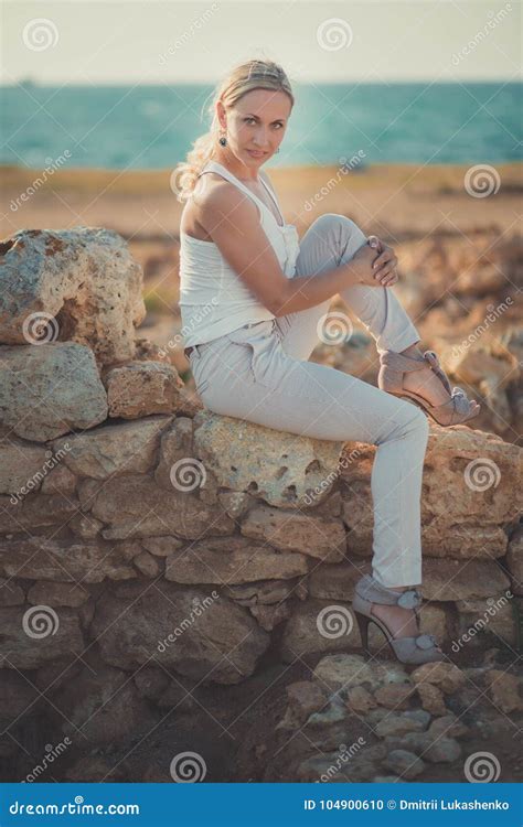 Amazing Lady Blond Woman In Light White Stylish Clothes Posing On Sea Side Beach Airsparkler