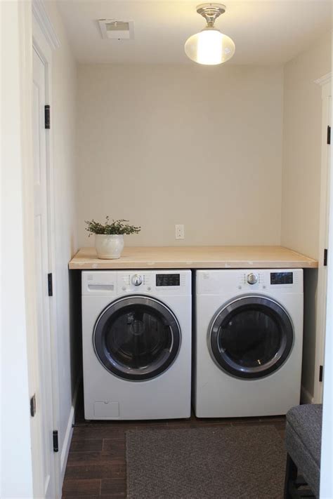 How to install a laundry closet countertop (laundry room remodel phase 1) click the red this week we made a laundry folding station shelf that goes over our front load laundry machines. Chic Little House: DIY Laundry Room Countertop | Mud room ...