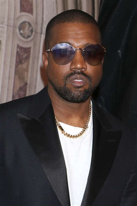 A Man Wearing Sunglasses Kanye West Attends The Ralph Lauren Show During New York Fashion Week